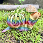 Blumentopf aus Kunstharz im 3D-Druck mit humorvoller Tierfigur