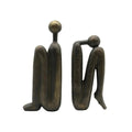 Buchstütze aus Kunstharz, beschwerte Figur in skulpturaler Form