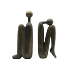 Buchstütze aus Kunstharz, beschwerte Figur in skulpturaler Form