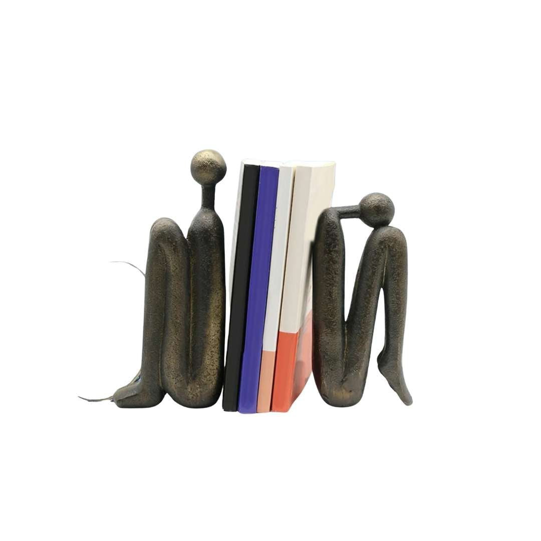 Buchstütze aus Kunstharz, beschwerte Figur in skulpturaler Form