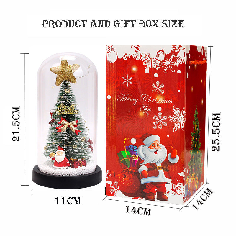 LED Weihnachtsbaum unter Glaskuppel mit warmer Beleuchtung