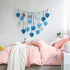 Makramee Wandgirlande aus Wolle, handgewebt mit Blattmotiven