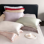 Satin Kissenbezug aus Lyocell mit Stehsaum und feiner Kontrastpaspel