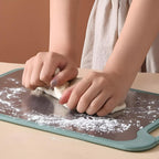 Schneidebrett aus Edelstahl, beidseitig mit Saftrille und Knoblauchreibe