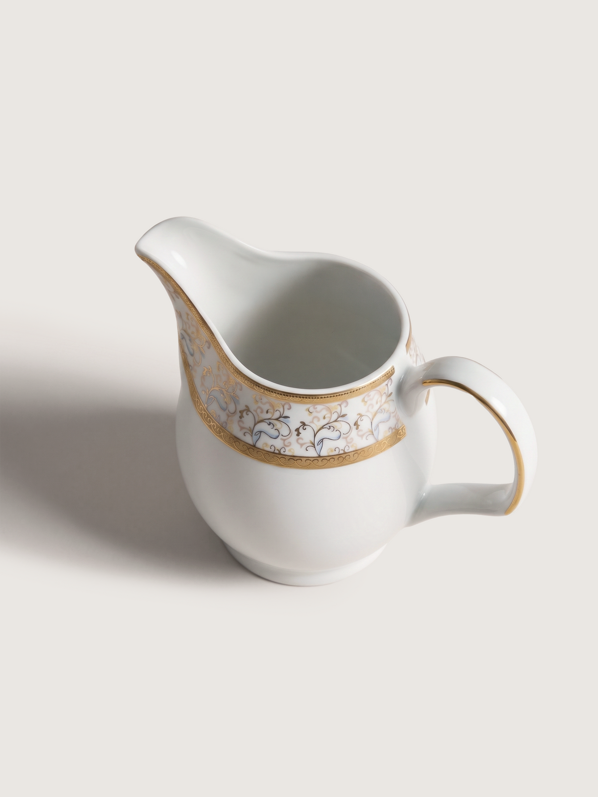 Teekanne aus Porzellan mit Milchkännchen und floralem Golddekor - Ansicht 2