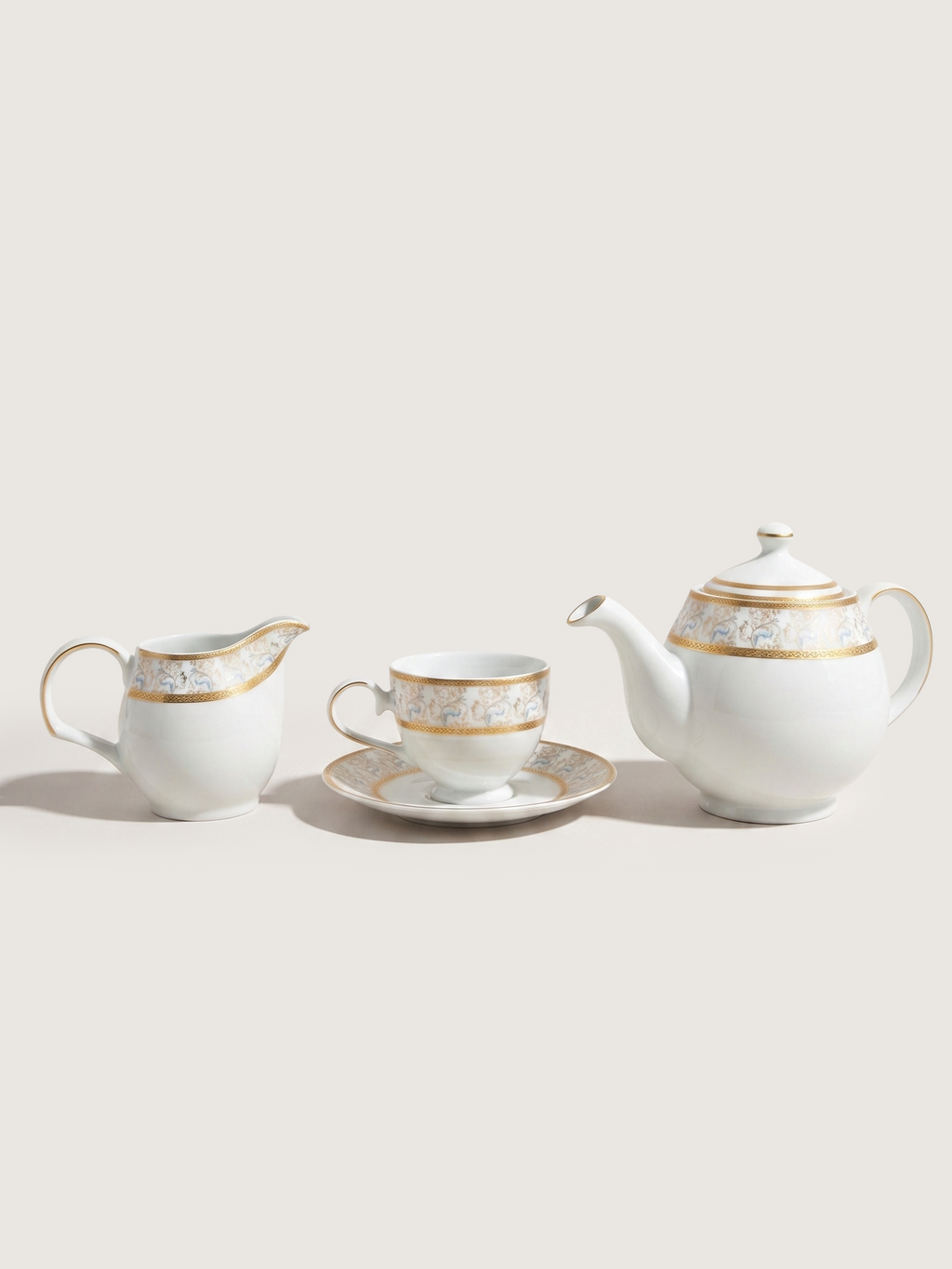 Teekanne aus Porzellan mit Milchkännchen und floralem Golddekor - Ansicht 7